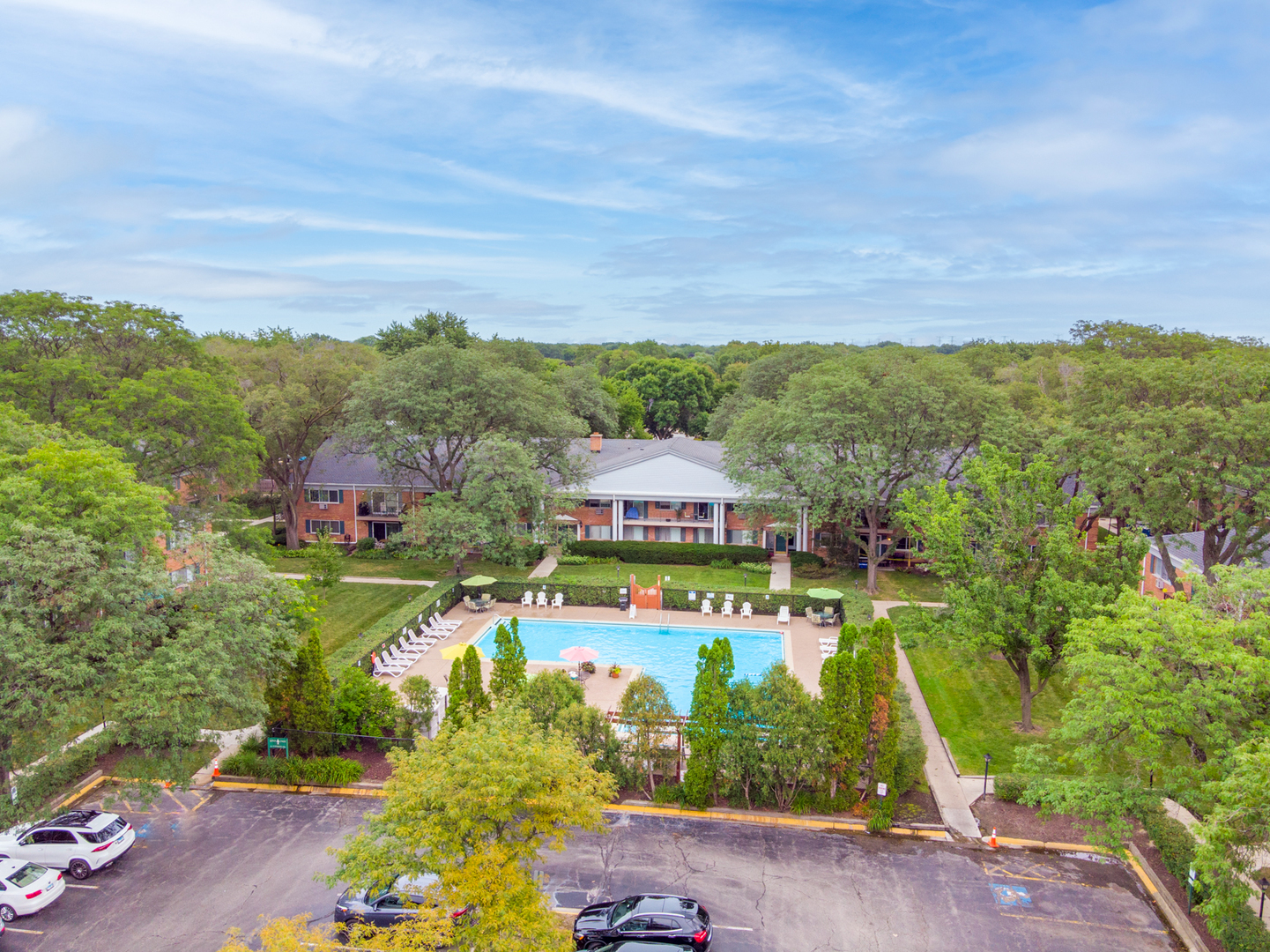 2323 South Goebbert Road, Unit 109 Arlington Heights, IL 60005 - Photo 19 of 22 an aerial view of residential houses with outdoor space and trees