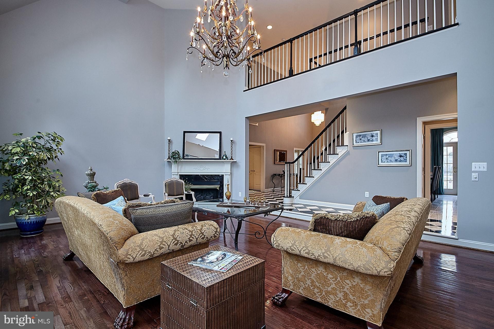 14923 Alpine Bay Loop Gainesville, VA 20155 - Photo 4 of 29 Living Room with Gleaming Hardwoods