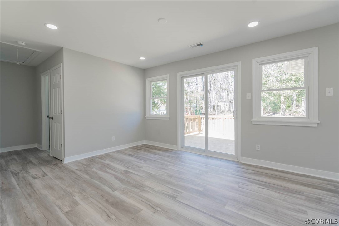 238 Monath Road North Chesterfield, VA 23236 - Photo 11 of 32 a view of an empty room with wooden floor and a window