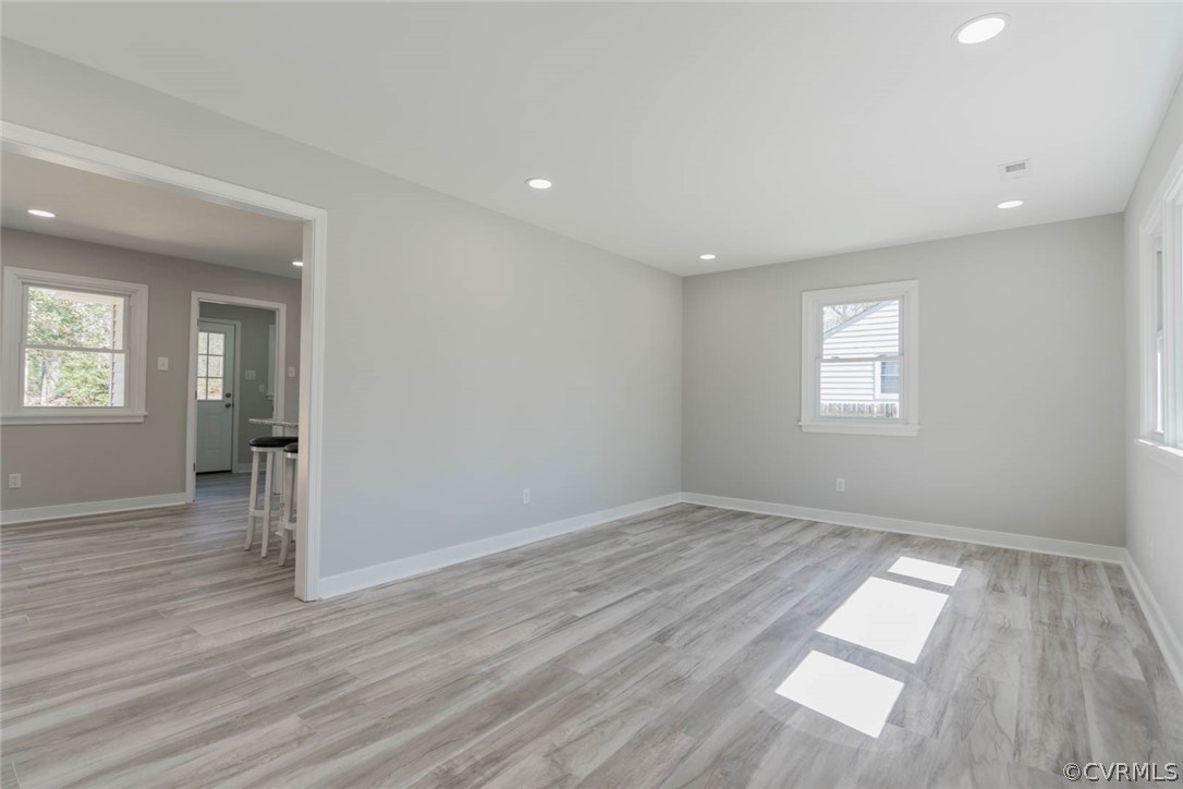 238 Monath Road North Chesterfield, VA 23236 - Photo 15 of 32 an empty room with wooden floor and windows