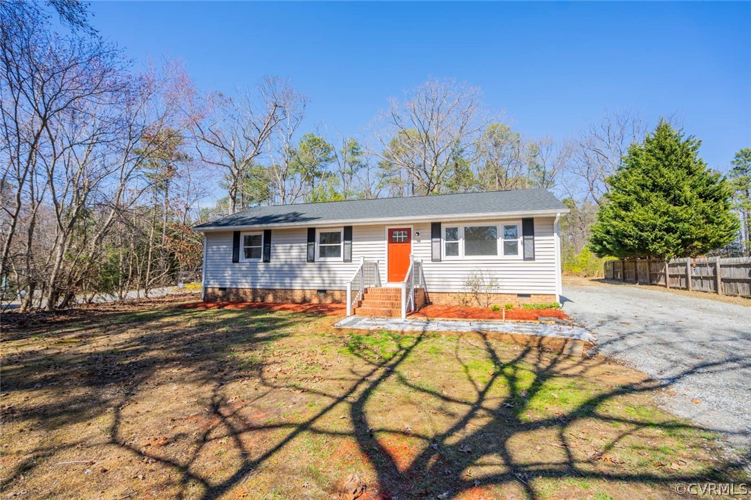 238 Monath Road North Chesterfield, VA 23236 - Photo 2 of 32 a front view of house with yard outdoor seating and covered with trees