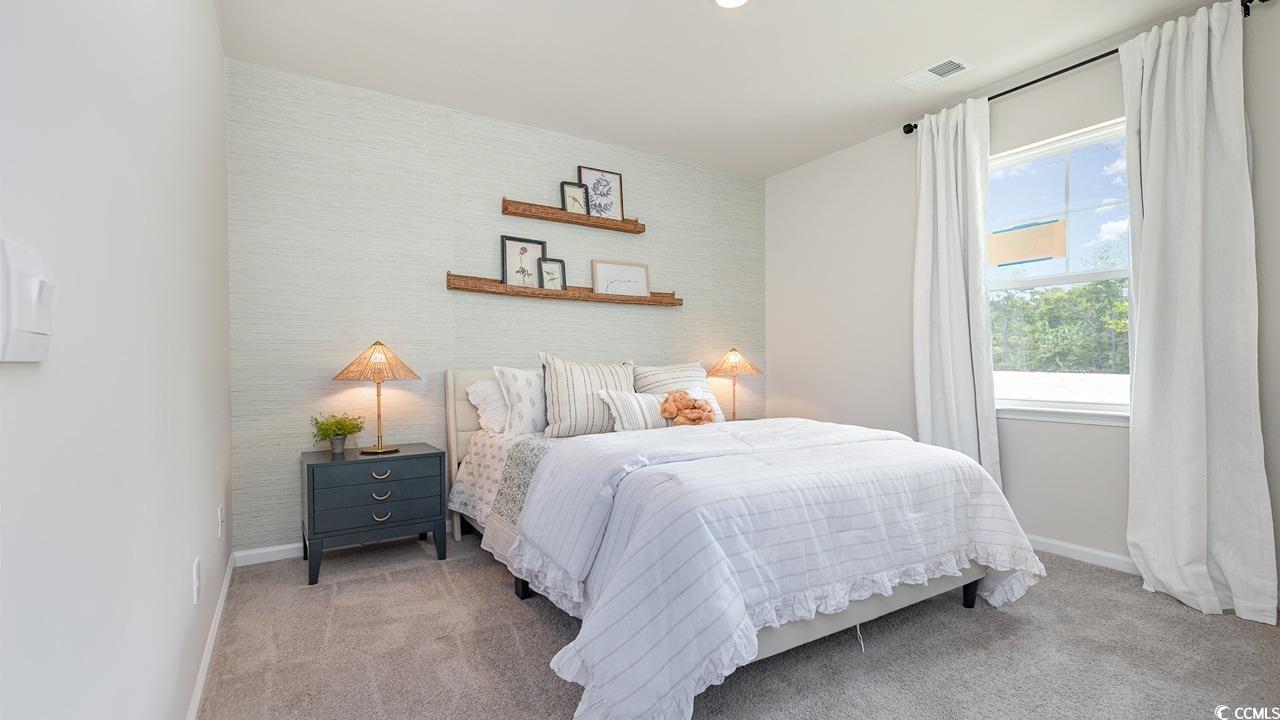 202 Dagger Court Myrtle Beach, SC 29588 - Photo 21 of 33 Carpeted bedroom featuring wallpapered walls, an accent wall, and recessed lighting