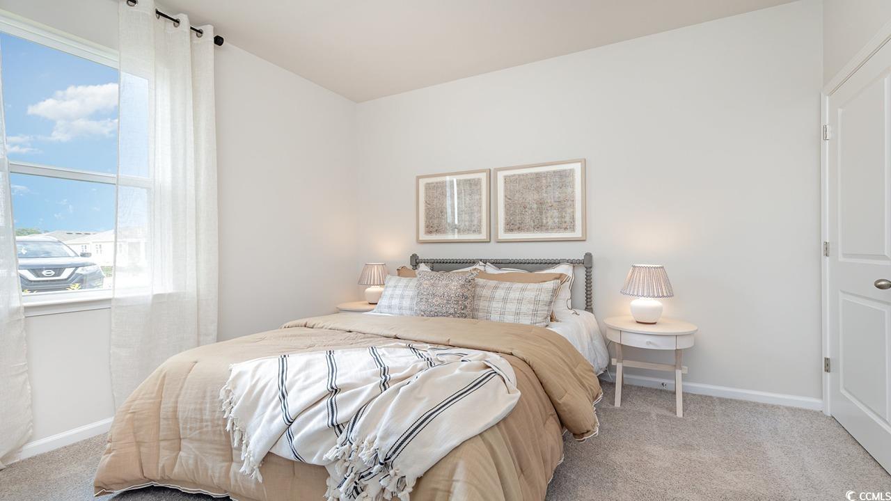 202 Dagger Court Myrtle Beach, SC 29588 - Photo 25 of 33 Carpeted bedroom with baseboards