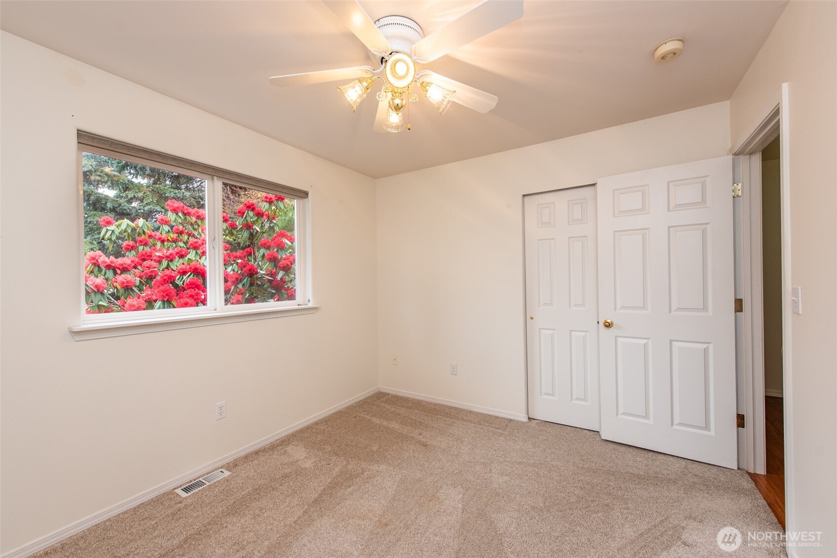 315 Dungeness Meadows Sequim, WA 98382 - Photo 19 of 36 an empty room with fan and lots of shelves