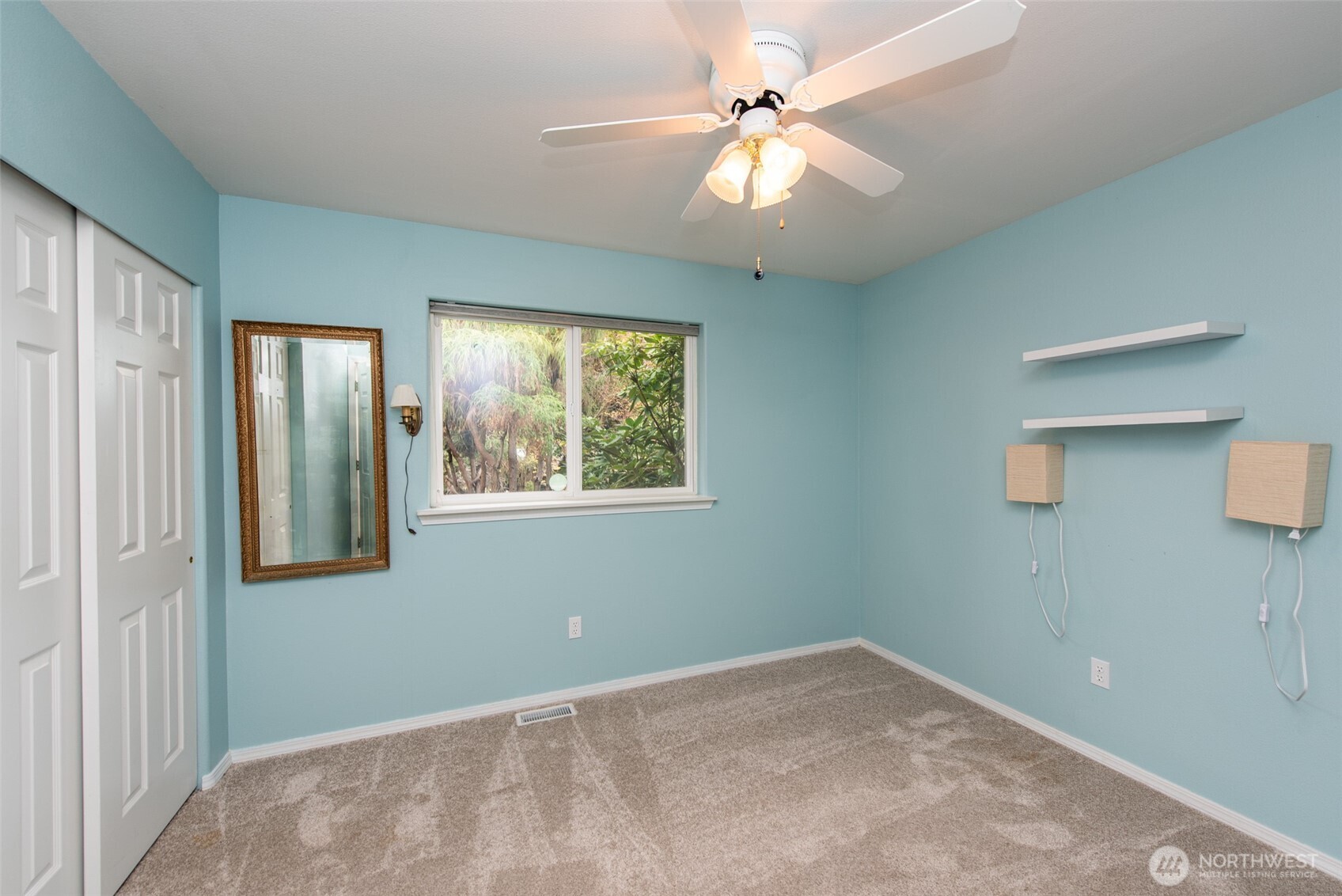 315 Dungeness Meadows Sequim, WA 98382 - Photo 20 of 36 an empty room with windows and fan