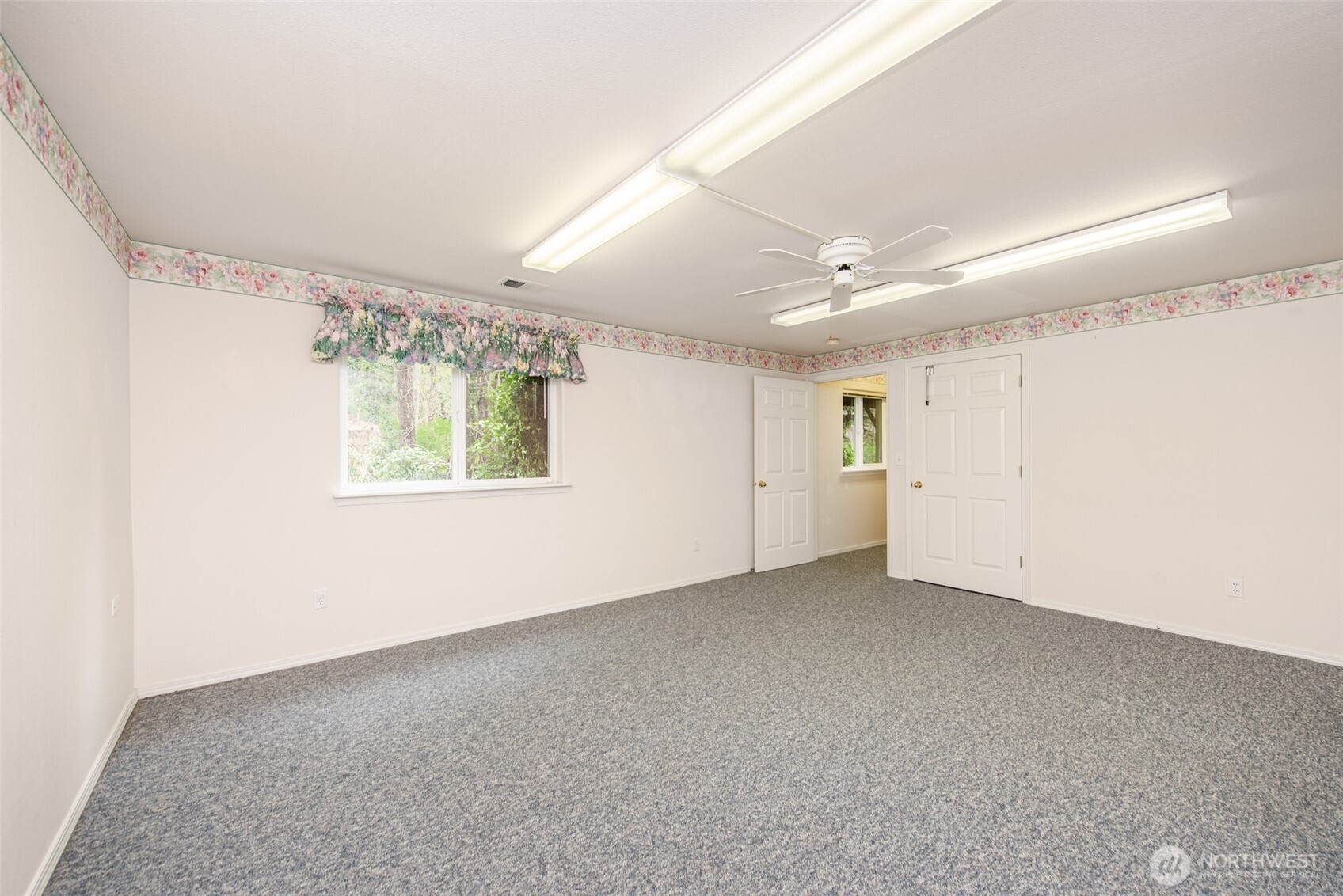 315 Dungeness Meadows Sequim, WA 98382 - Photo 24 of 36 a view of an empty room with a window