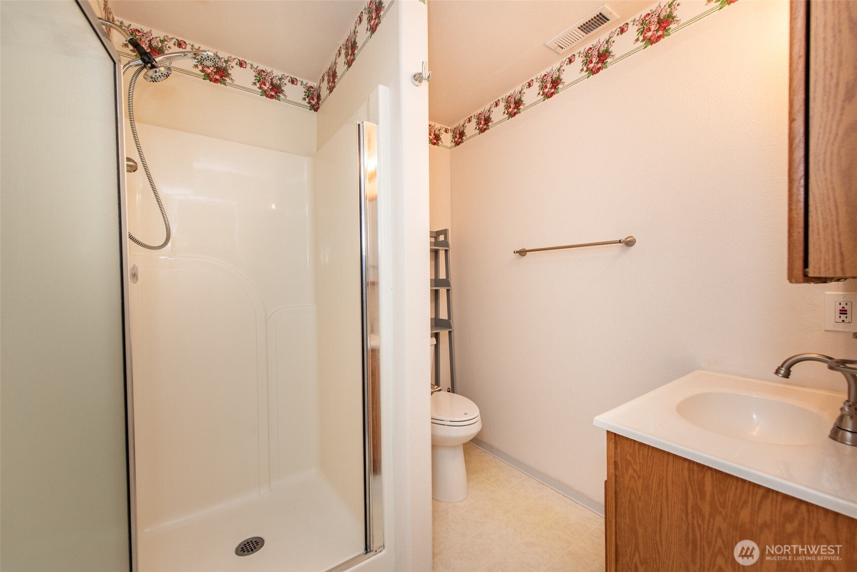 315 Dungeness Meadows Sequim, WA 98382 - Photo 25 of 36 a bathroom with a sink a toilet and shower