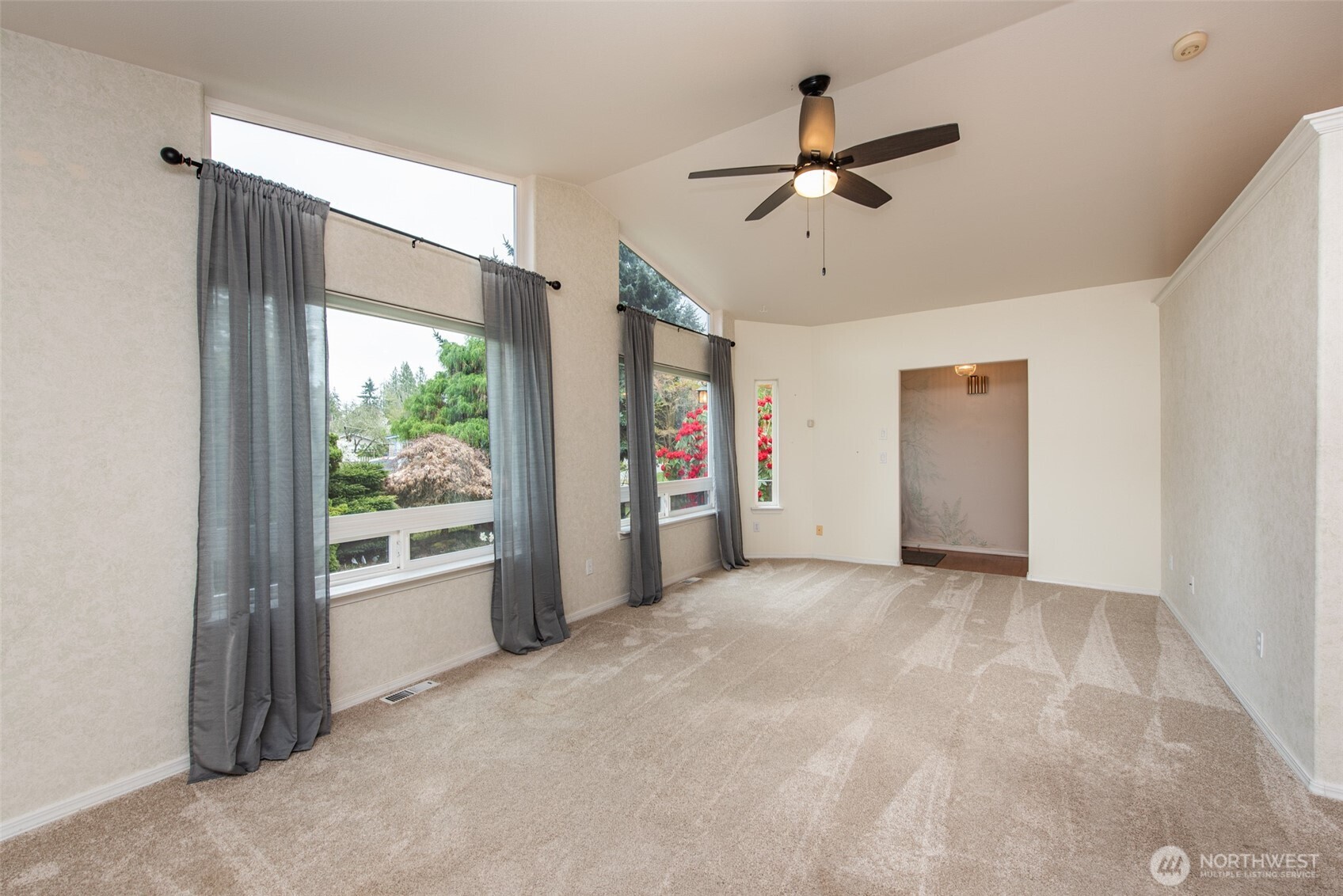 315 Dungeness Meadows Sequim, WA 98382 - Photo 6 of 36 a view of a livingroom with a ceiling fan and window
