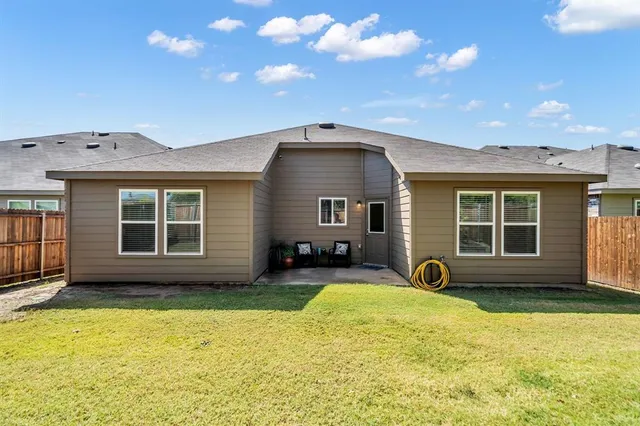 a view of walk in closet with wooden floor