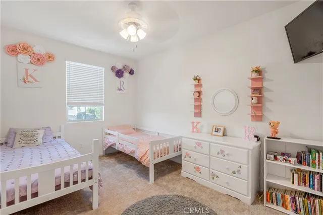 a backyard with table and chairs