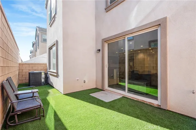 a view of a park with large trees