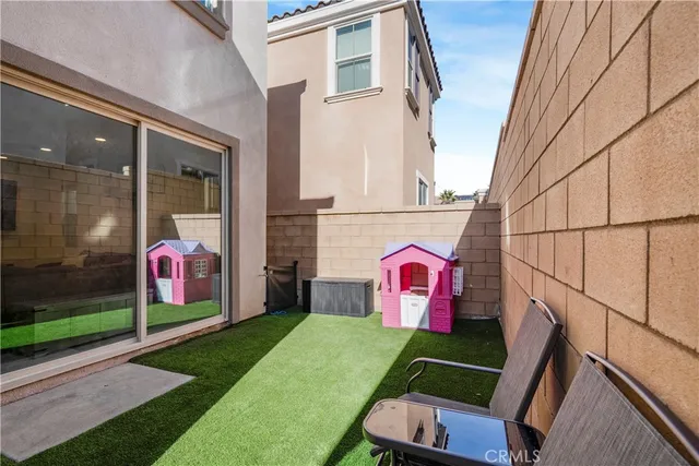 a view of a park with swings and slides