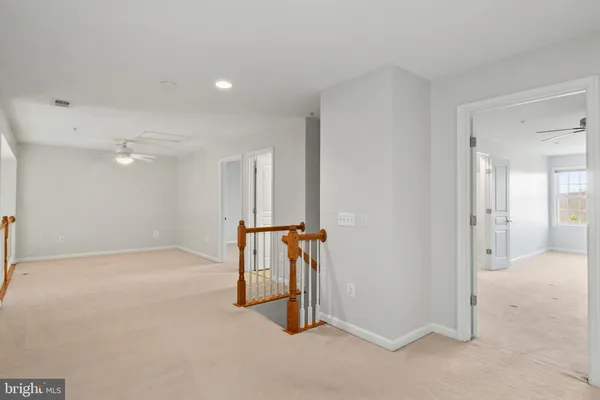 a view of empty room with windows