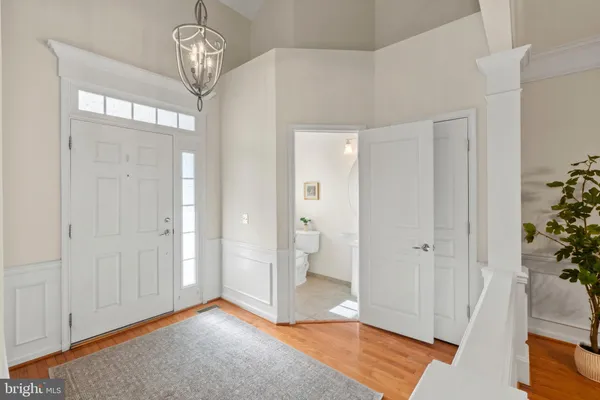 a view of empty room and wooden floor
