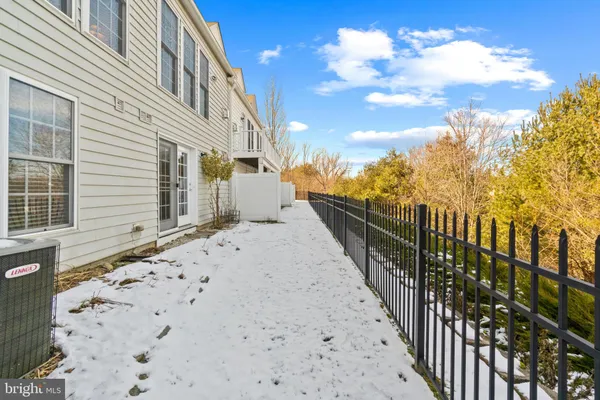 a view of a pathway with a yard