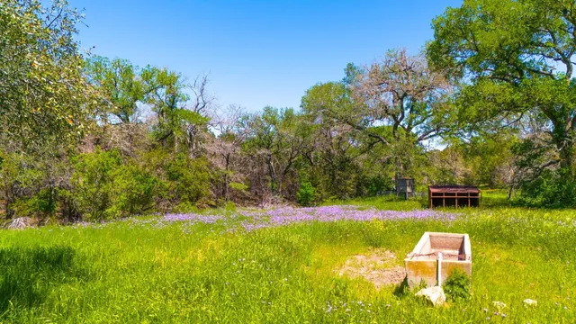 a view of swimming pool with an outdoor space and seating area