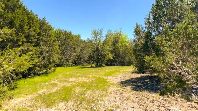 a view of swimming pool with an outdoor space and seating area