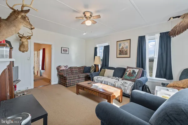 a bedroom with furniture and a bed