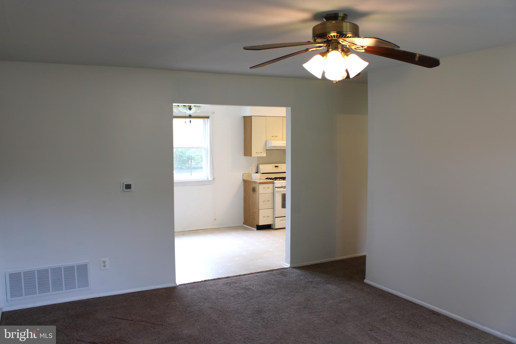 42 Forge Road Medford, NJ 08055 - Photo 2 of 10 a view of an empty room with a window
