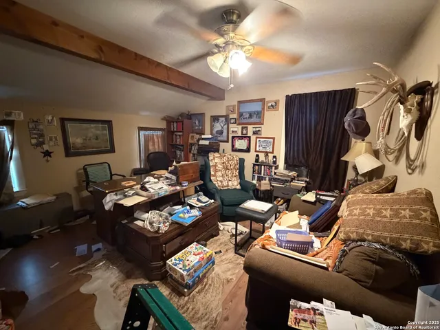 a view of a balcony with furniture