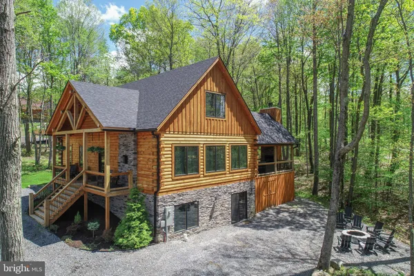 a front view of a house with yard