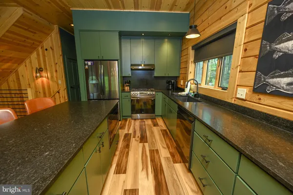 a bathroom with a toilet and shower