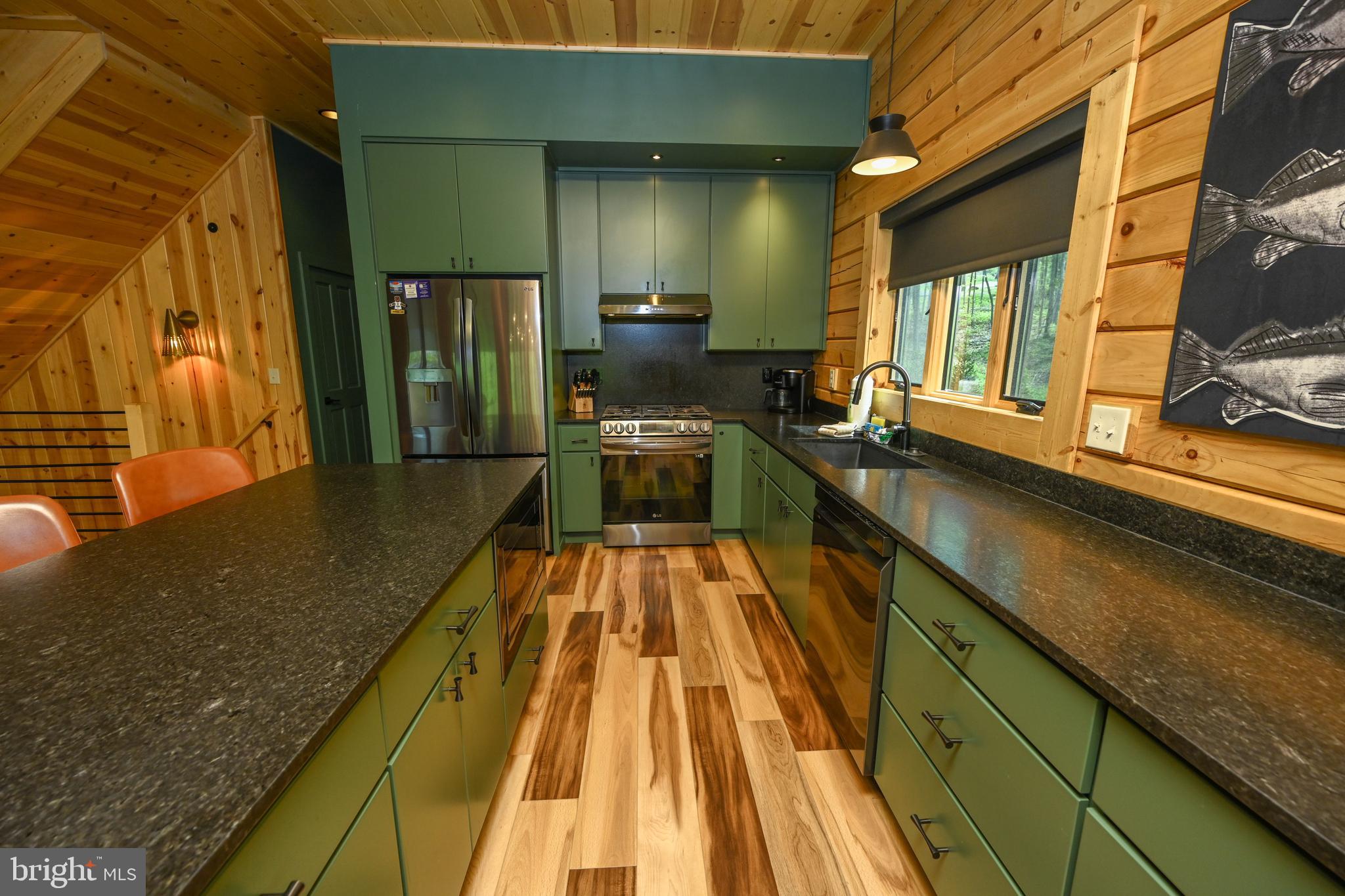 1067 North Camp Road McHenry, MD 21541 - Photo 18 of 81 a view of a kitchen with a large window