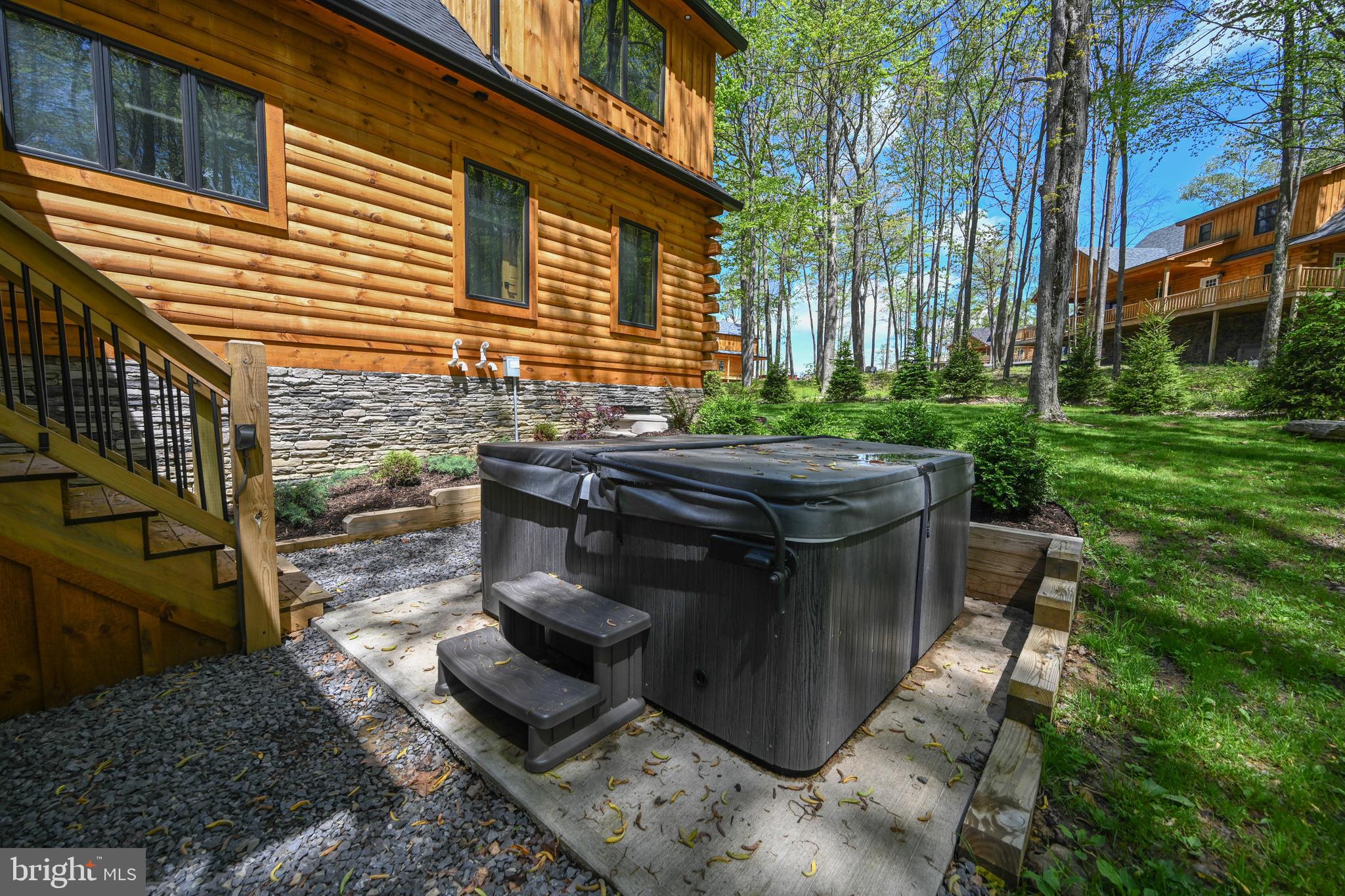 1067 North Camp Road McHenry, MD 21541 - Photo 24 of 81 a view of a backyard with sitting area