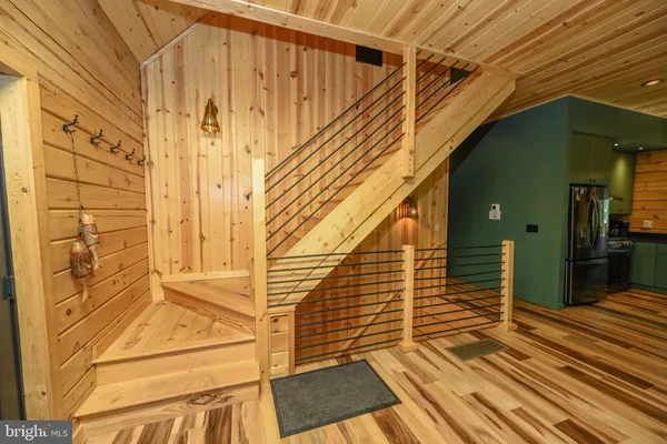 a bedroom with a bed and a table