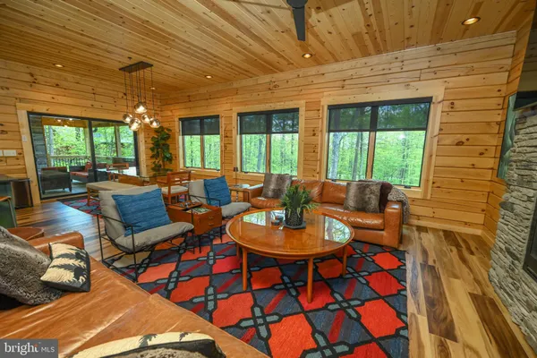 a view of swimming pool with seating area