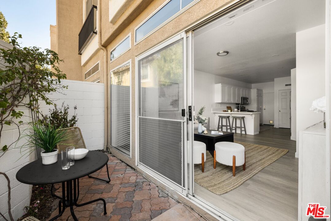 4140 Brookcrest Court Moorpark, CA 93021 - Photo 12 of 27 a living room with furniture and a table