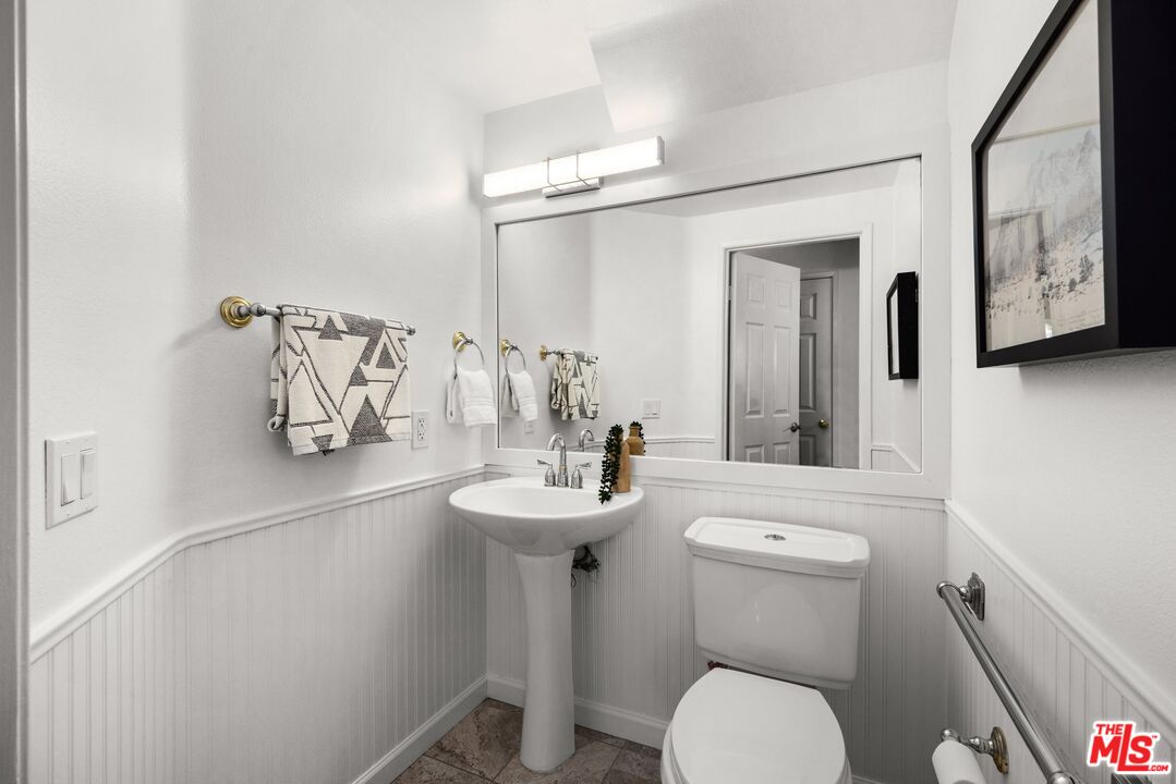 4140 Brookcrest Court Moorpark, CA 93021 - Photo 13 of 27 a bathroom with a toilet a sink and mirror