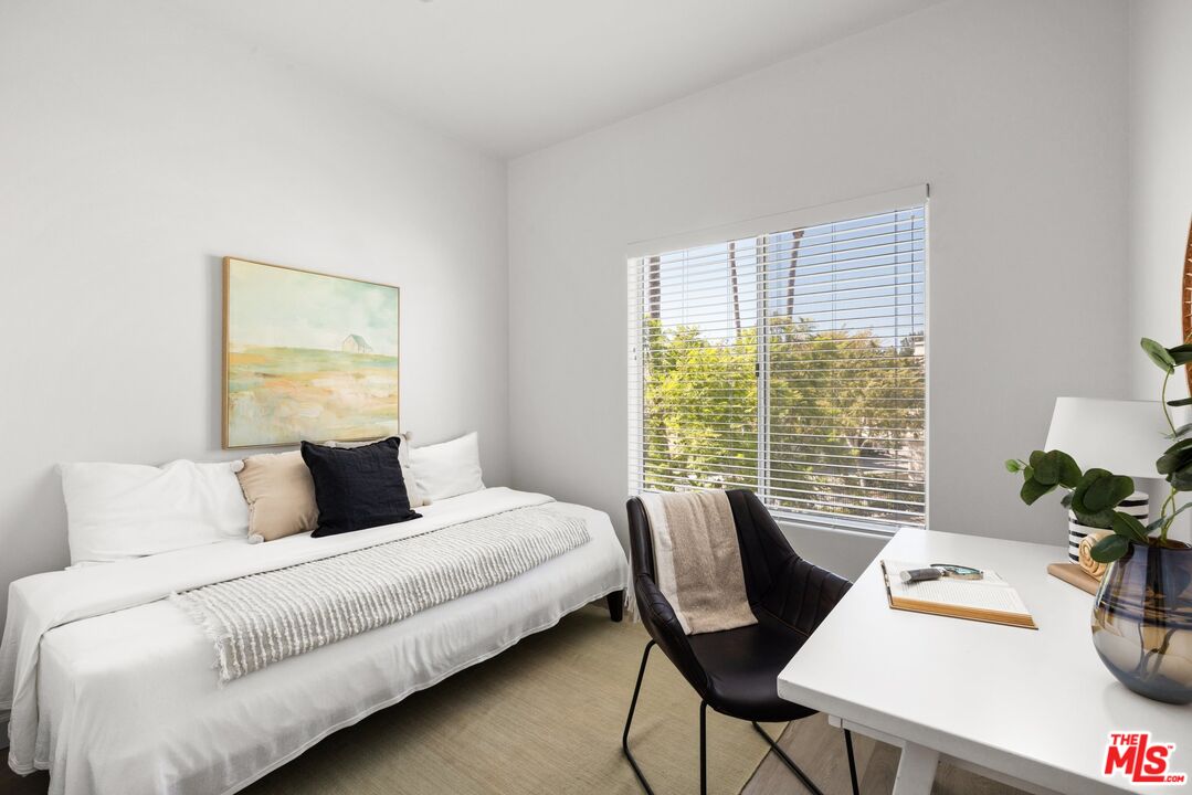 4140 Brookcrest Court Moorpark, CA 93021 - Photo 19 of 27 a bedroom with a bed and a couch