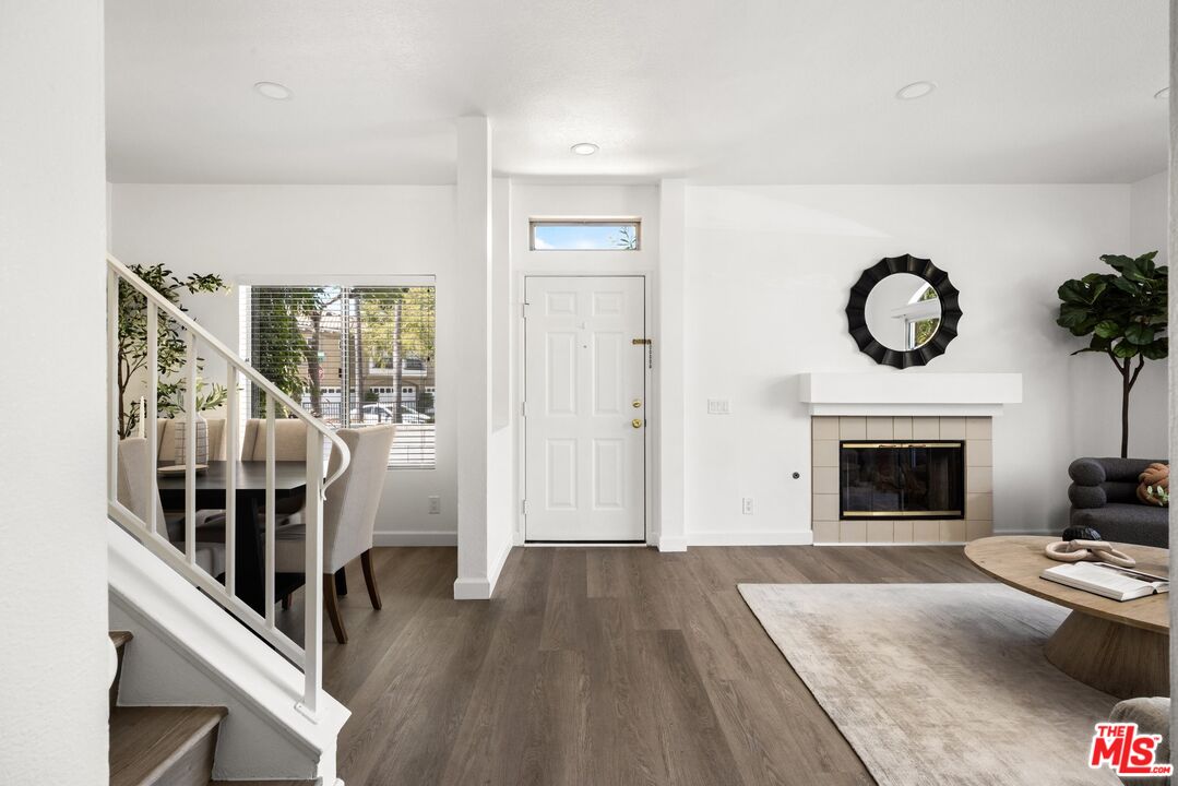 4140 Brookcrest Court Moorpark, CA 93021 - Photo 2 of 27 a view of a livingroom with furniture and a fireplace