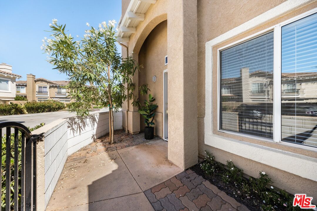 4140 Brookcrest Court Moorpark, CA 93021 - Photo 23 of 27 a view of a house with a backyard