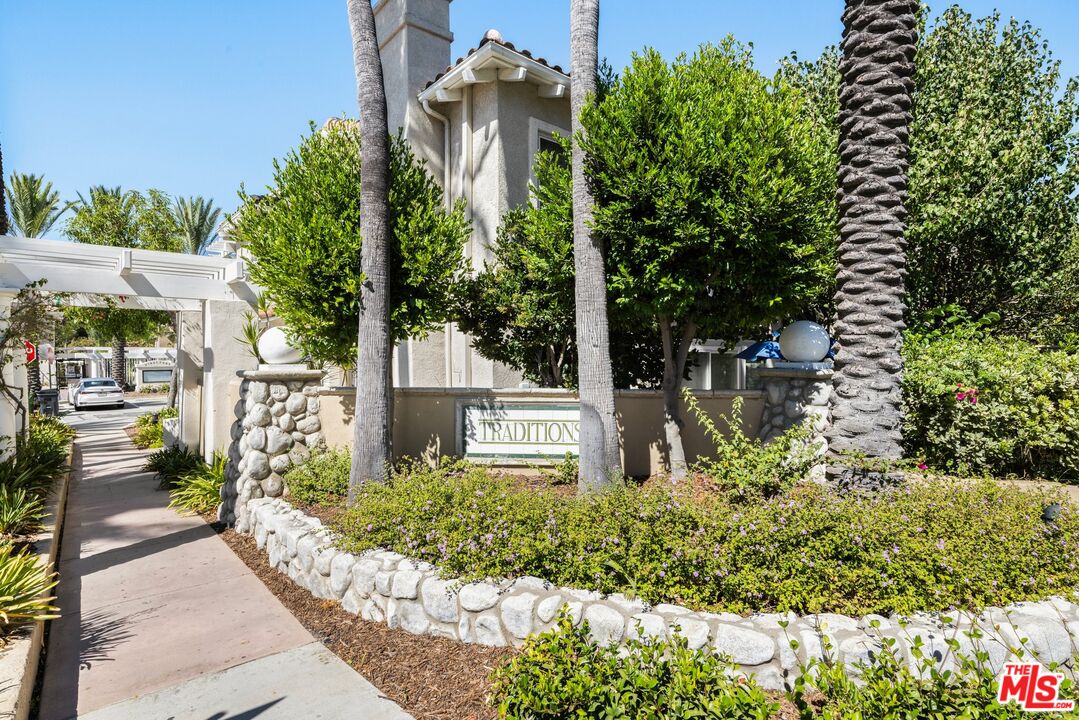 4140 Brookcrest Court Moorpark, CA 93021 - Photo 24 of 27 a view of a house with a garden