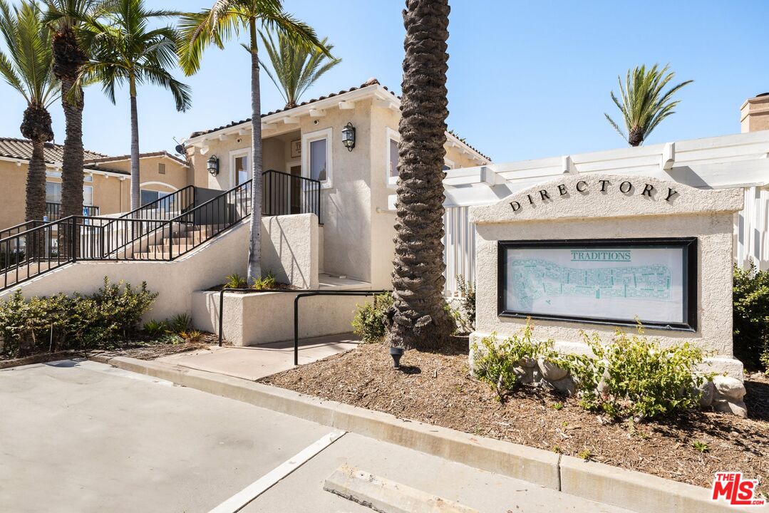 4140 Brookcrest Court Moorpark, CA 93021 - Photo 26 of 27 a front view of a building with entryway and outdoor space