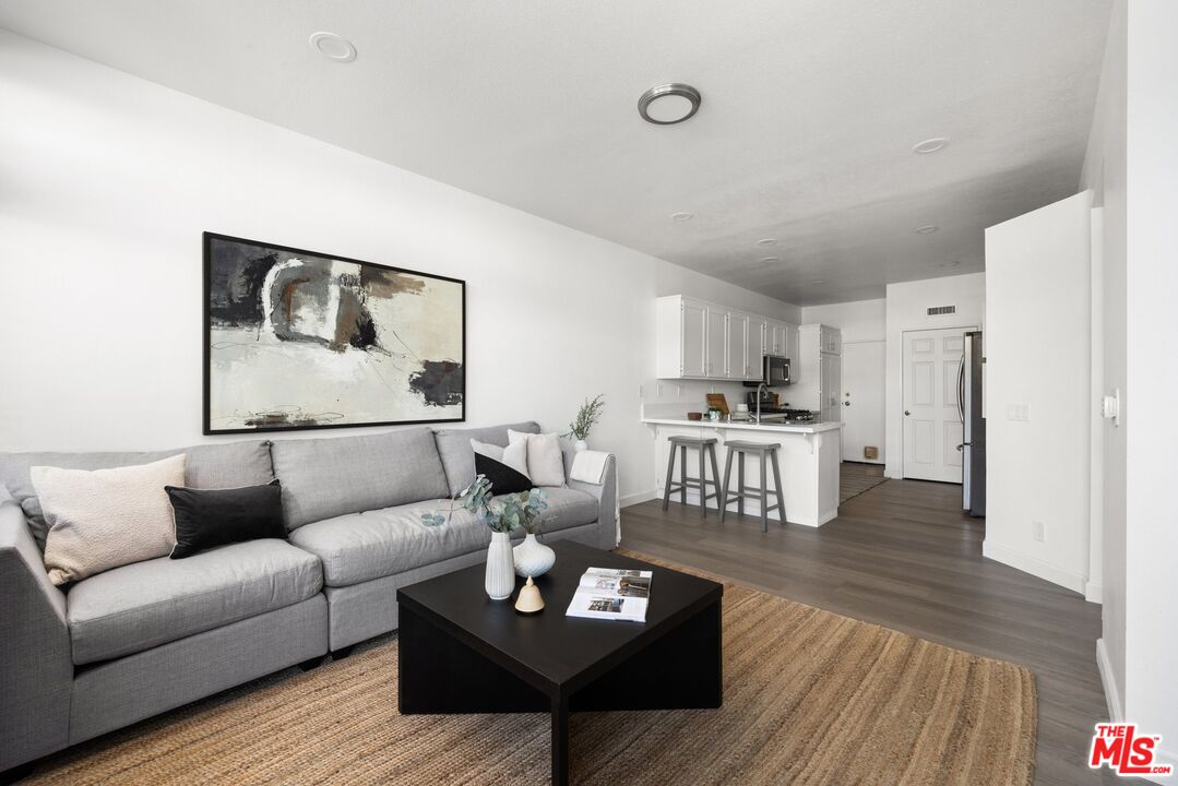 4140 Brookcrest Court Moorpark, CA 93021 - Photo 6 of 27 a living room with furniture and a wooden floor