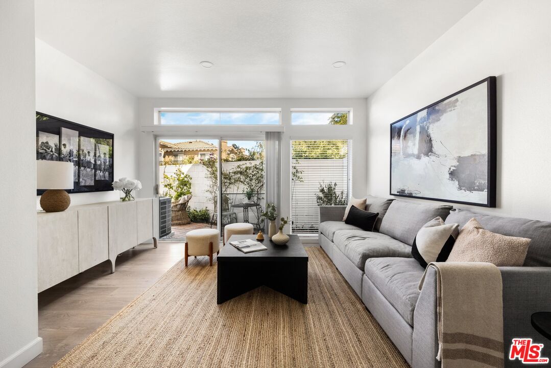 4140 Brookcrest Court Moorpark, CA 93021 - Photo 7 of 27 a living room with furniture and a flat screen tv