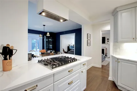 a view of a living room and floor to ceiling window