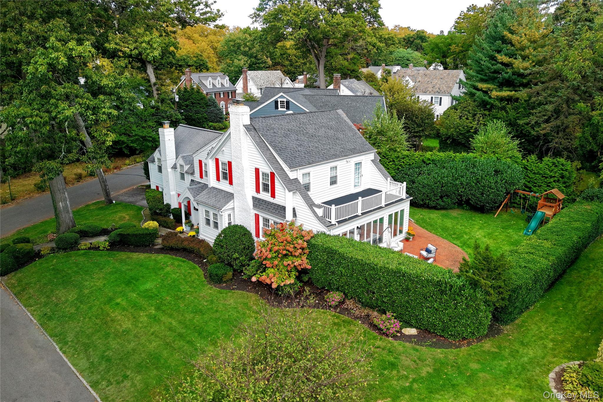 60 Thayer Road Manhasset, NY 11030 - Photo 2 of 28 a aerial view of a house