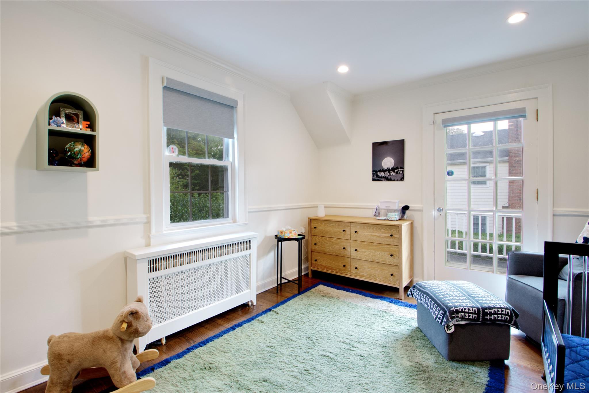 60 Thayer Road Manhasset, NY 11030 - Photo 23 of 28 a living room with furniture and a window