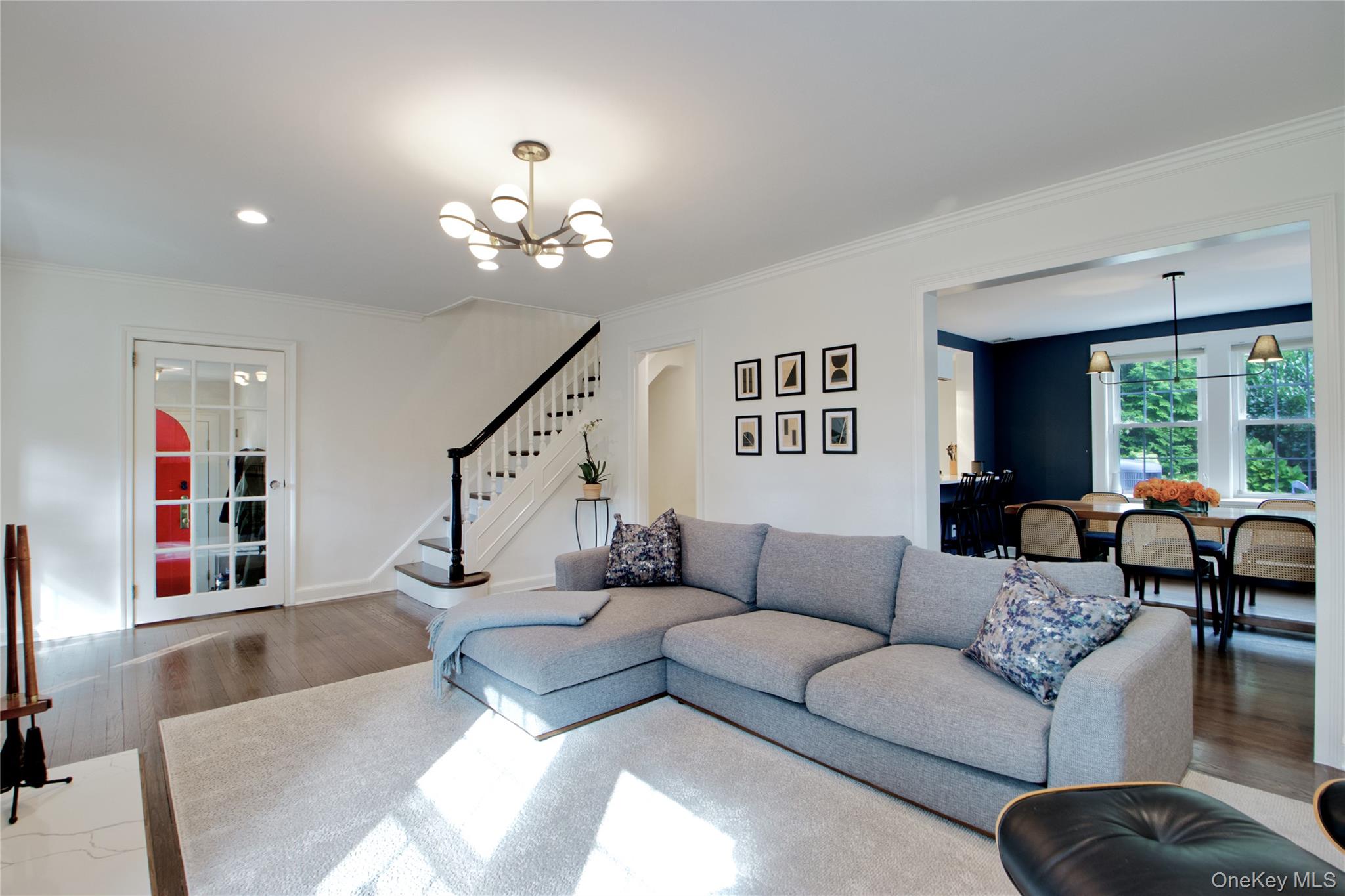 60 Thayer Road Manhasset, NY 11030 - Photo 7 of 28 a living room with furniture and a large window