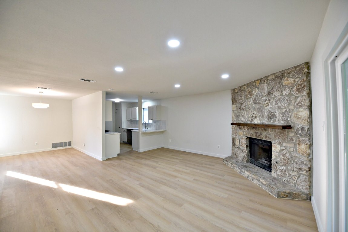 4617 Sidereal Drive Austin, TX 78727 - Photo 8 of 23 a view of a livingroom with a fireplace