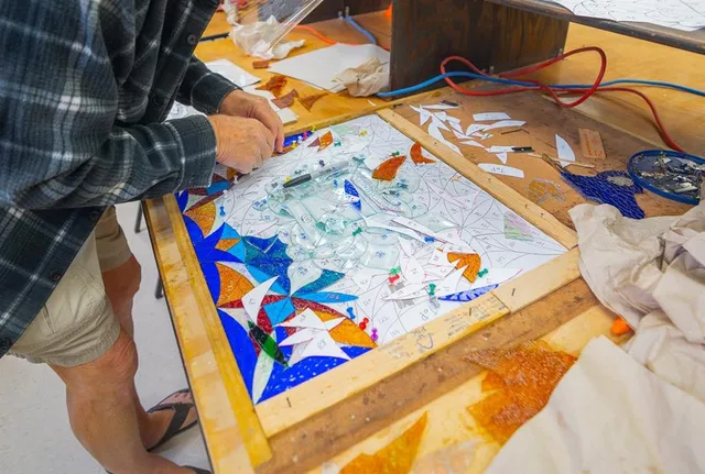 an outdoor view of a house with outdoor space and barbeque oven