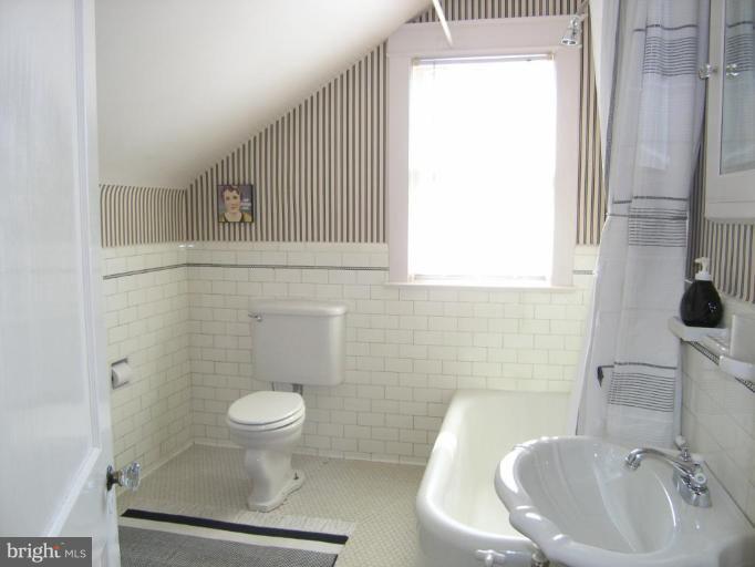 2030 Glen Ross Road Silver Spring, MD 20910 - Photo 2 of 23 a bathroom with a sink a toilet and shower