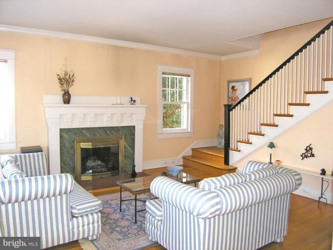 2030 Glen Ross Road Silver Spring, MD 20910 - Photo 3 of 23 a living room with furniture fireplace and a window
