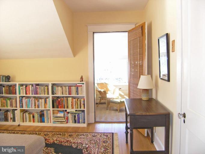 2030 Glen Ross Road Silver Spring, MD 20910 - Photo 10 of 23 a living room with furniture and a book shelf