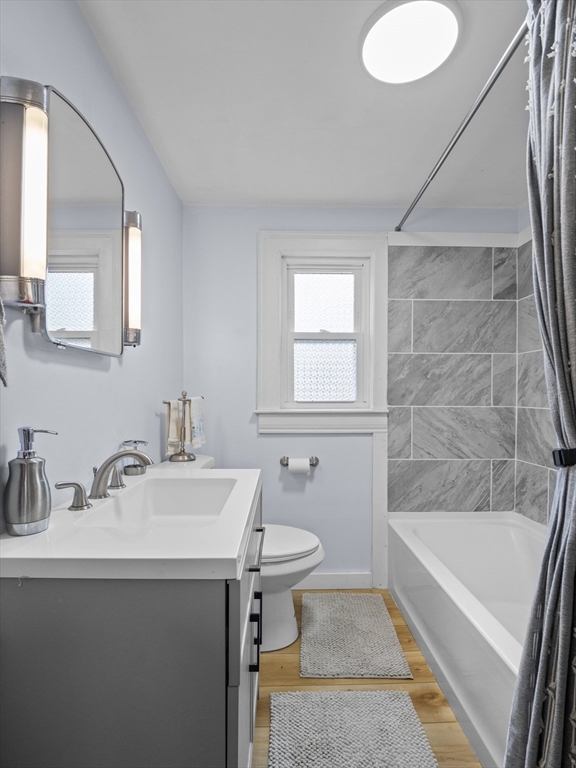 354 Townsend Road Groton, MA 01450 - Photo 14 of 39 a bathroom with a sink a toilet and bathtub