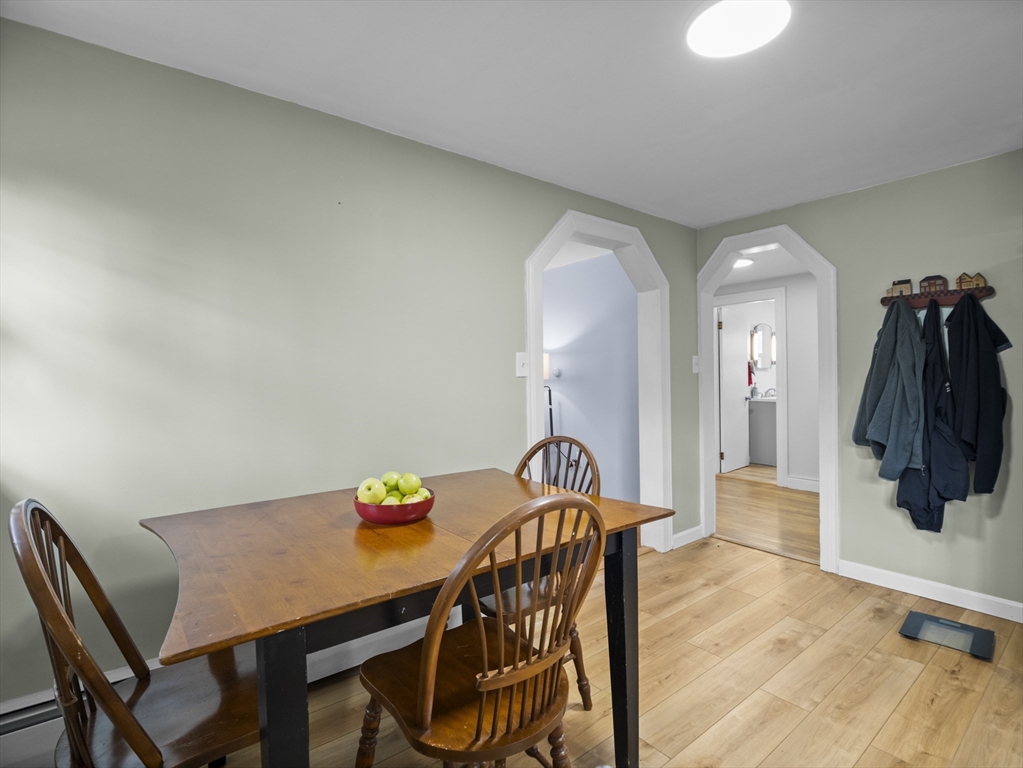 354 Townsend Road Groton, MA 01450 - Photo 19 of 39 a view of a dining room with furniture and wooden floor